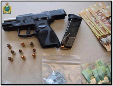 Gun and currency seized. Photo supplied by Niagara Regional Police