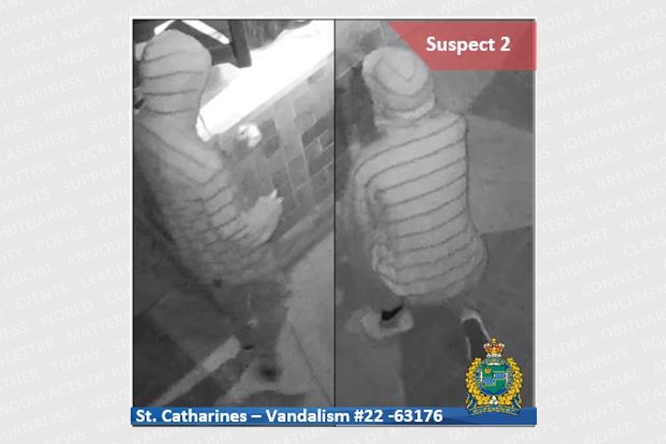 Police hope to identify suspects responsible for 13 incidents of racist, hateful graffiti found in St. Catharines on the morning of June 12, 2022