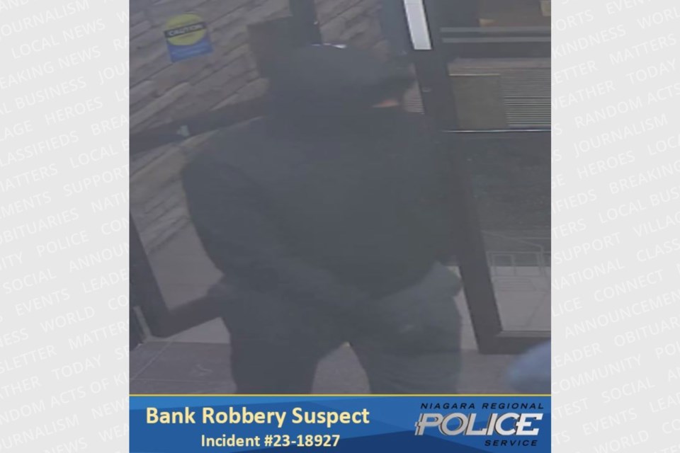 Niagara Regional Police are looking for two suspects in connection with an armed bank robbery in Niagara Falls.