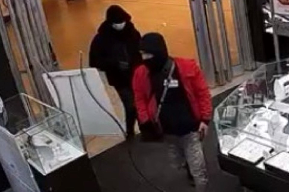 Police are asking the public to help identify four suspects who robbed two stores in the Pen Centre on Monday.
