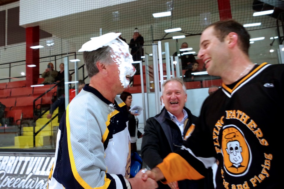 After taking the official face-off, Mike Braun of the Mounts gets a pie in the face for his troubles. Bob Liddycoat / Thorold News