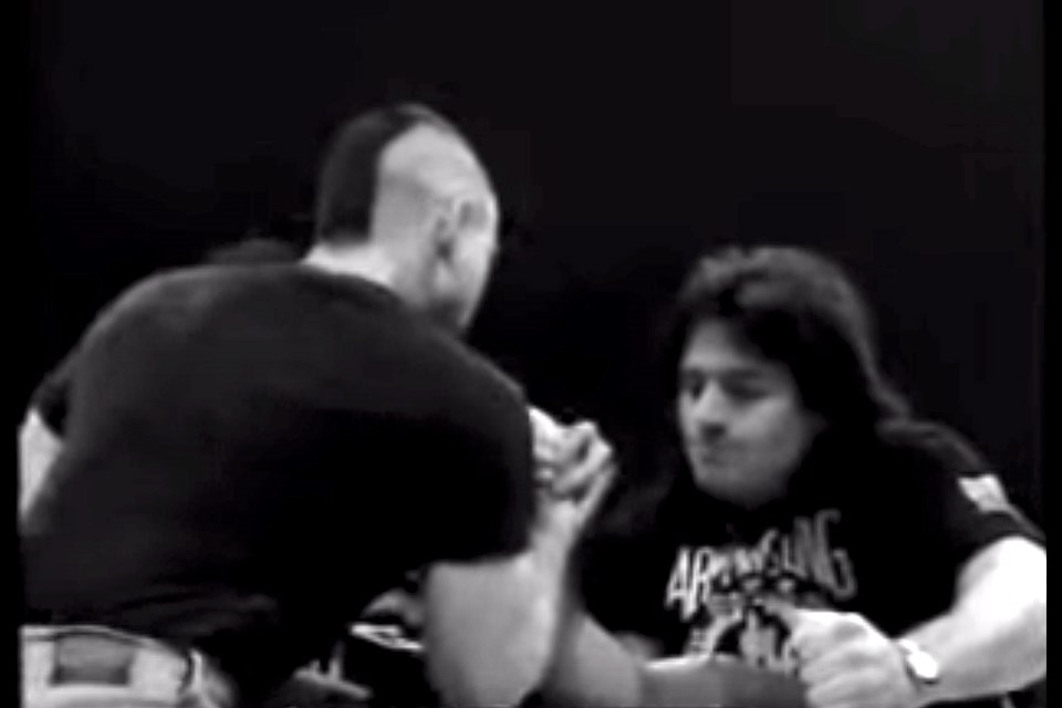 Paul Cecchini, Canadian vs.  Tony Dure, of Great Britain - Bras De Fer 1991 - World of Armwrestling.com. See video link in story