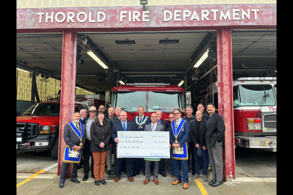 Members of the Thorold Museum Board, President Malcolm Woodhouse, Mountain Lodge No. 221, Councillors Tim O'Hare, Anthony Longo, and Jim Handley, BIA Char Serge Carpino. 