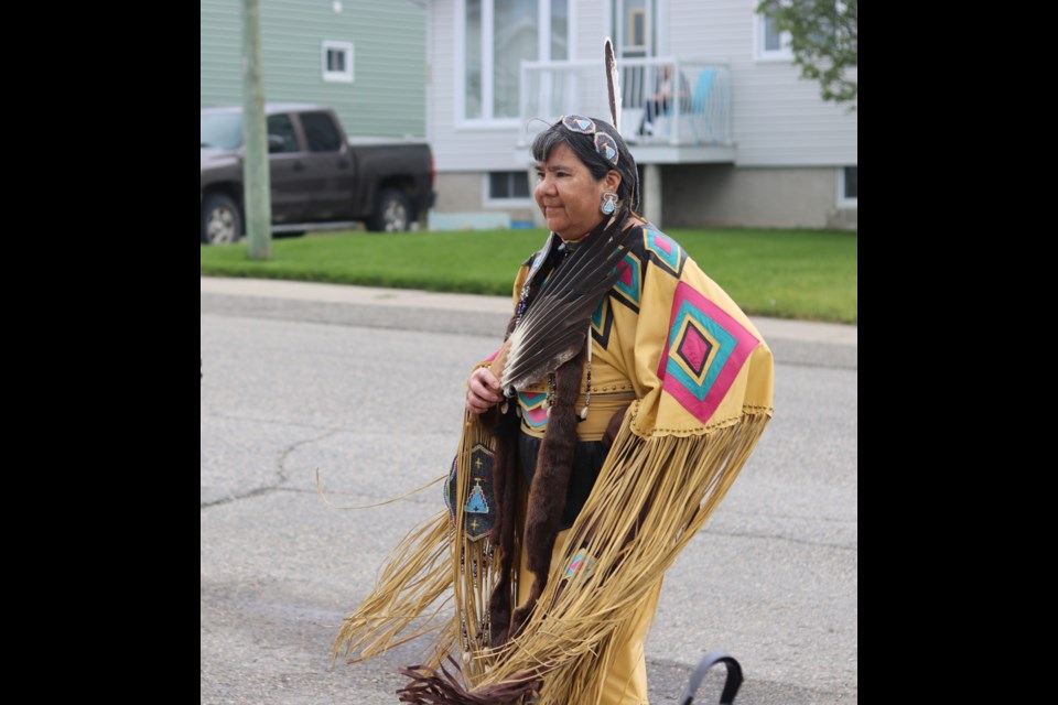 Holly Buffalo Rodrique dances to pay tribute to residential school survivors.