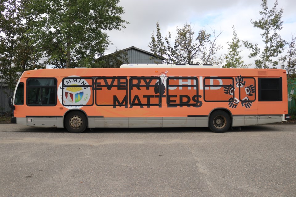 The bus was wrapped in orange as part of the City of Timmins' "Orange the City" initiative.