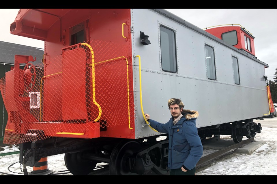 Paul Raiche, museum attendant with the Timmins Museum: National Exhibition Centre, shows off the ONR caboose set up in front of the museum this week. Wayne Snider for TimminsToday