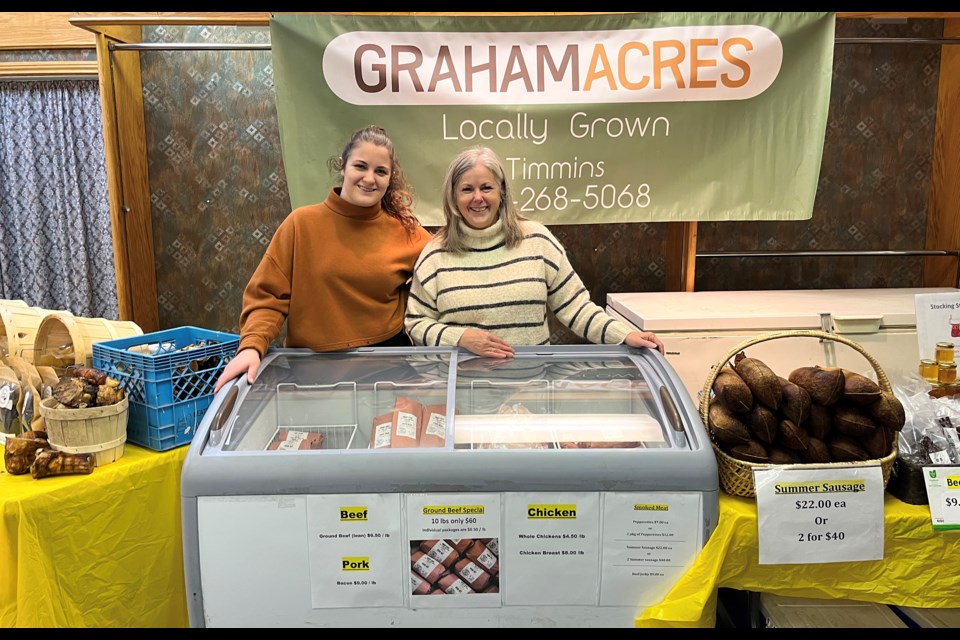 Sarah and Nicole Graham tend the booth for Graham Acres at a recent Holiday Pop Up Shop in Downtown Timmins. Graham Acres provides farm-fresh products such as beef, chicken, pork, turkey, vegetables, eggs and more from the 35-acre farm on Shirley Street in Timmins.