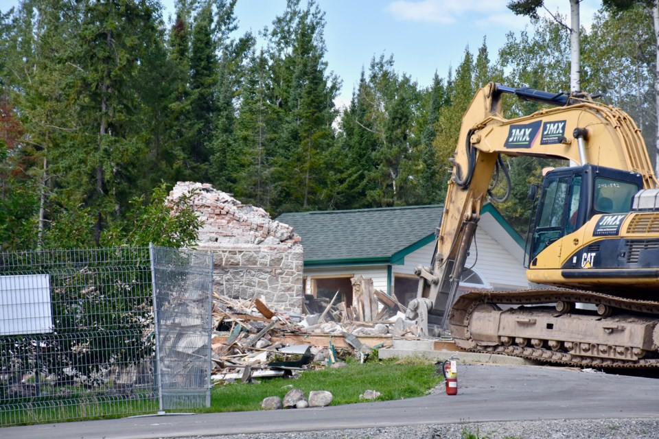 Crews demolish the historic mine manager's house on Gold Mine Road. Maija Hoggett/TimminsToday