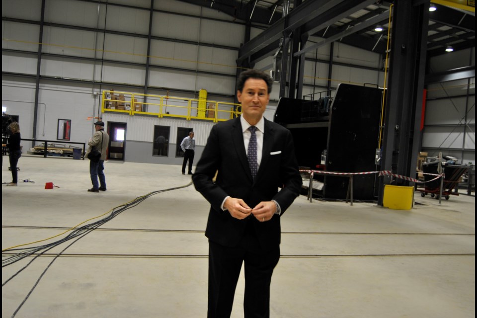 Steve Paikin, host of TVO's "The Agenda" standing in the midst of the cavernous The Bucket Shop facility that served as the backdrop for a discussion on Timmins and region's economy. Frank Giorno for TimminsToday.