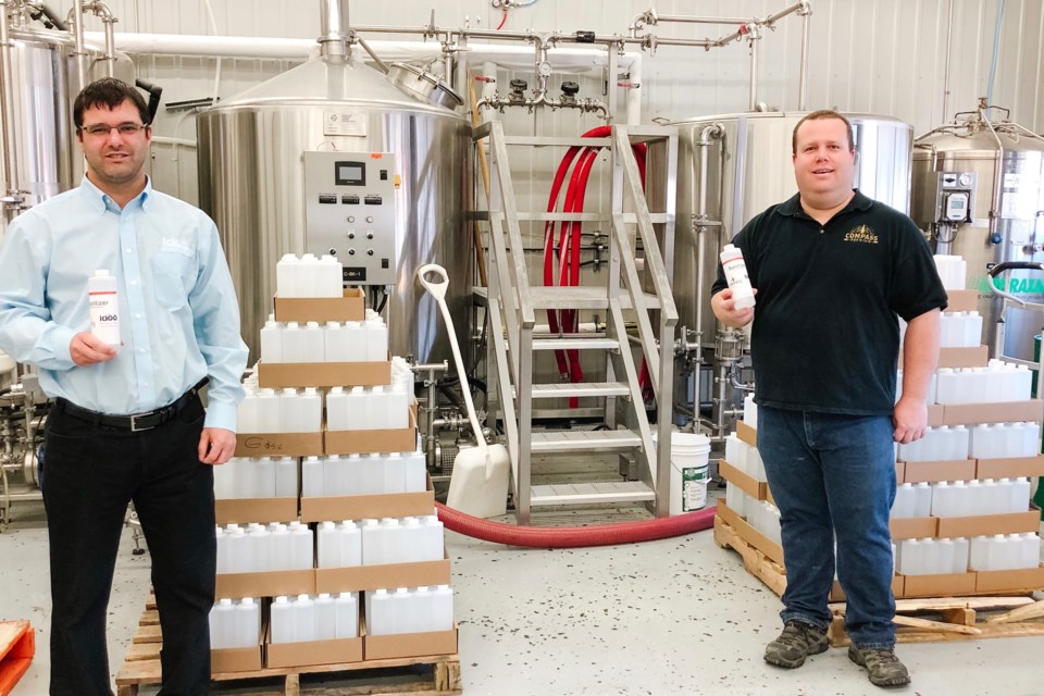 Glencore Kidd Operations general manager Mark Furlotte and one of Compass Brewing's owners Kevin Patriquin. (Supplied photo)