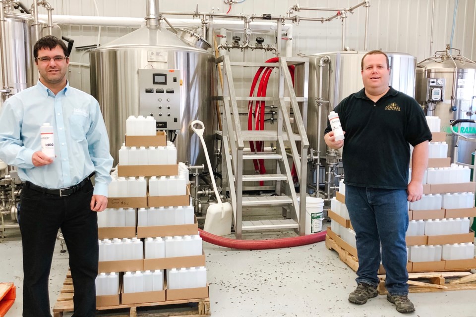 Glencore Kidd Operations general manager Mark Furlotte and one of Compass Brewing's owners Kevin Patriquin. Supplied photo