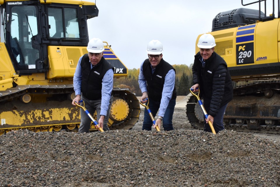 SMS Equipments Dennis Chmielewski, Robin Heard and Alain Bedard official break ground on the company's new facility in the west end of Timmins.