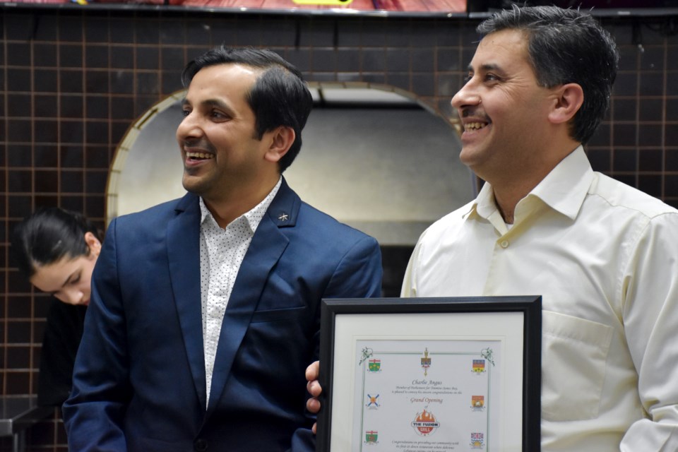 The Fusion Grill co-owners Vakkas Momaya and Fawaz Alahmed.
