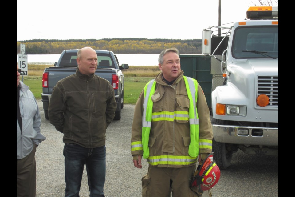 Entrepeneur and Volunteer Firefighter Brian Nankervis (right) speaks to the crowd outside of Northern College on Thursday. Andrew Autio for TimminsToday                               