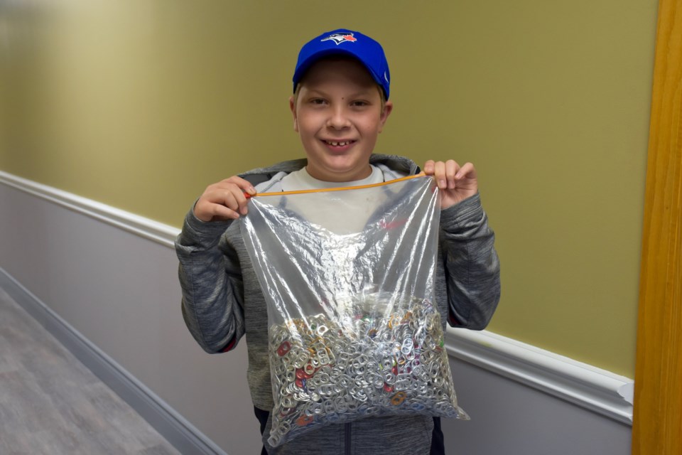 Over the last couple of years, Aiden Boychuk collected pop tabs to donate to the March of Dimes.