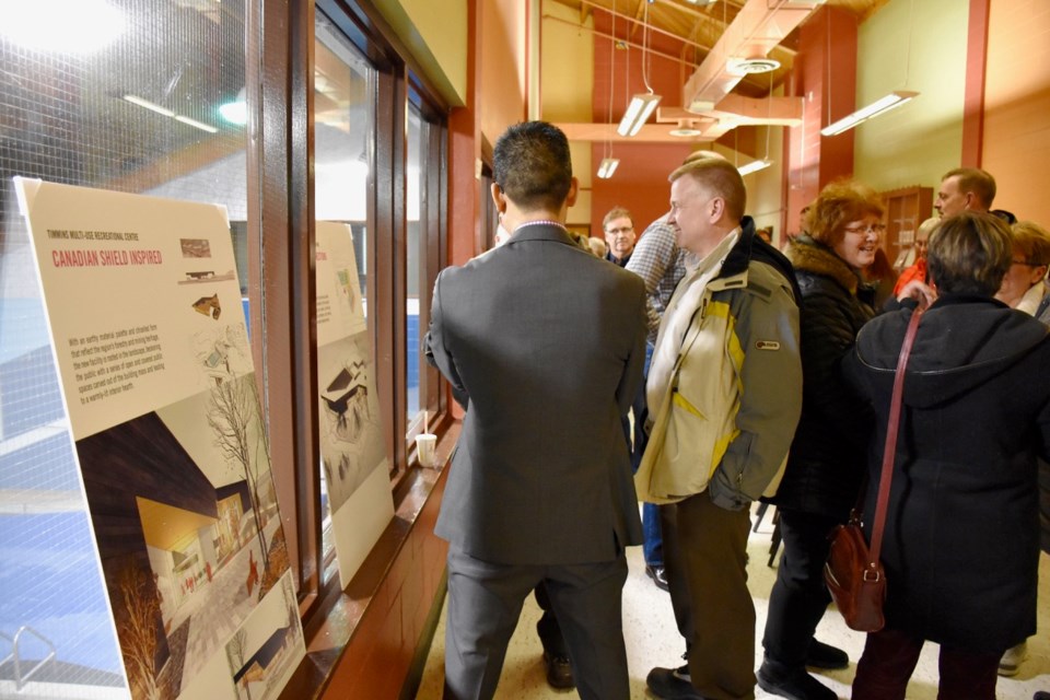 Residents look over designs for the proposed aquatic centre in Timmins at a public meeting held at the Archie Dillon Sportsplex. Maija Hoggett/TimminsToday