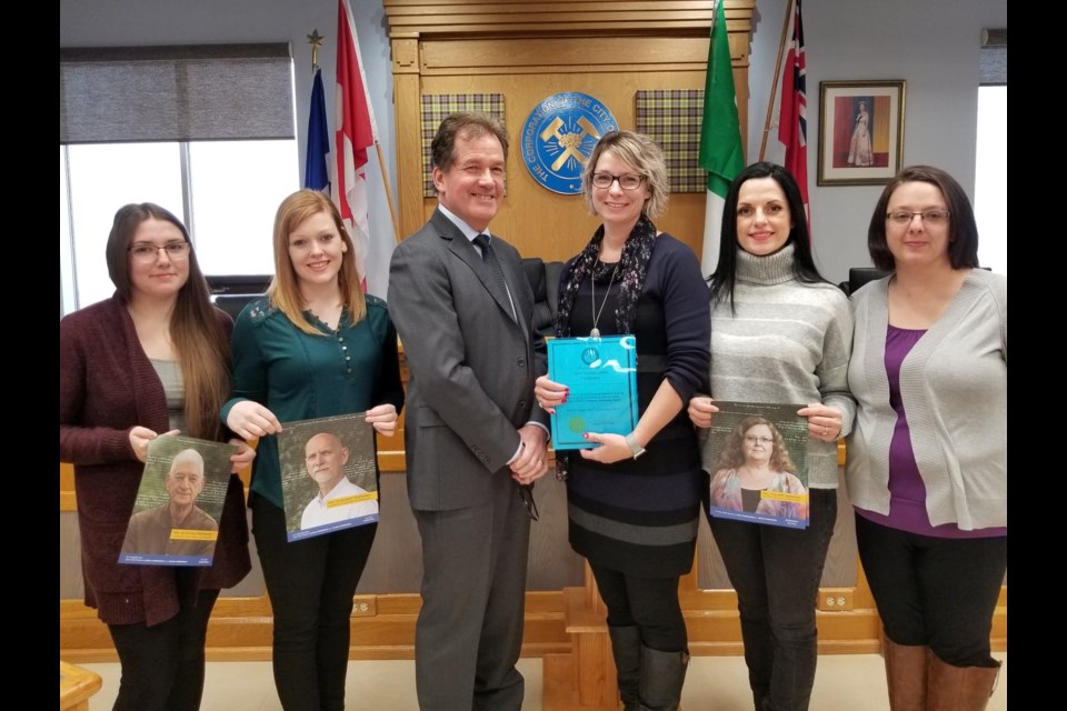 The Alzheimer Society of Timmins-Porcupine District executive director Tracy Koskamp-Bergeron and staff joined Timmins Mayor George Pirie to proclaim January as Alzheimer's Awareness Month. Supplied photo