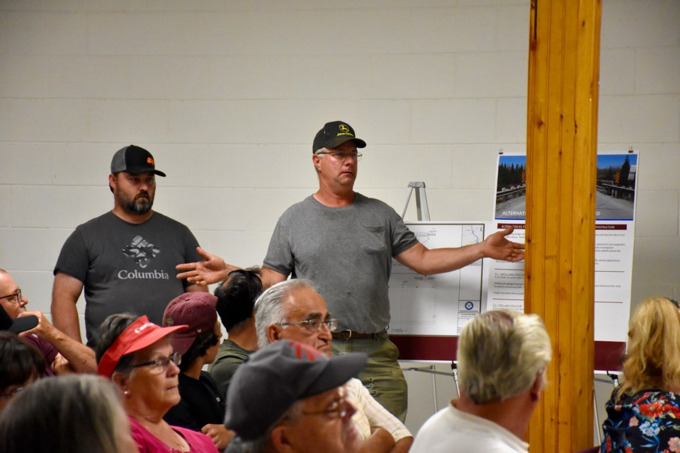 Impassioned residents talk about their concerns at the public meeting for the Hoyle bridge closure.