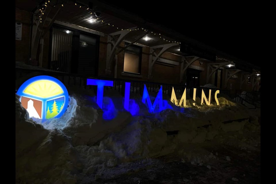 The sign Downtown Timmins is blue and yellow in support of the Ukraine.