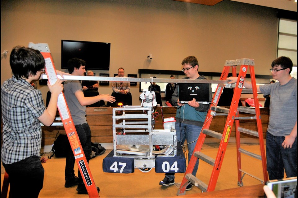 The robotics team from Timmins High demonstrates their climbing robot. From left to right Grant Wagoner, Jared Wagoner, Stan Street and Niko Loretto. Frank Giorno for TimminsToday.