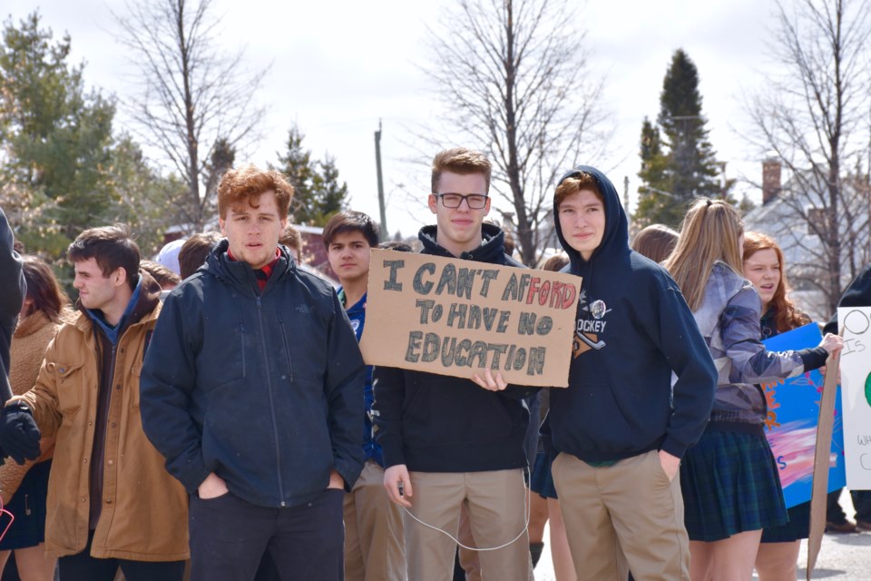 Students made signs to protest the Ford government's cuts to education. Maija Hoggett/TimminsToday