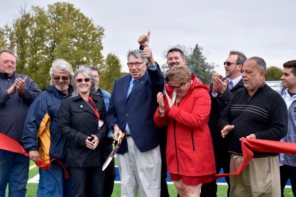 District School Board Ontario North East board chair Bob Brush and director of education Lesleigh Dye officially cut the ribbon at Timmins High and Vocational School's new track and field. Maija Hoggett/TimminsToday 