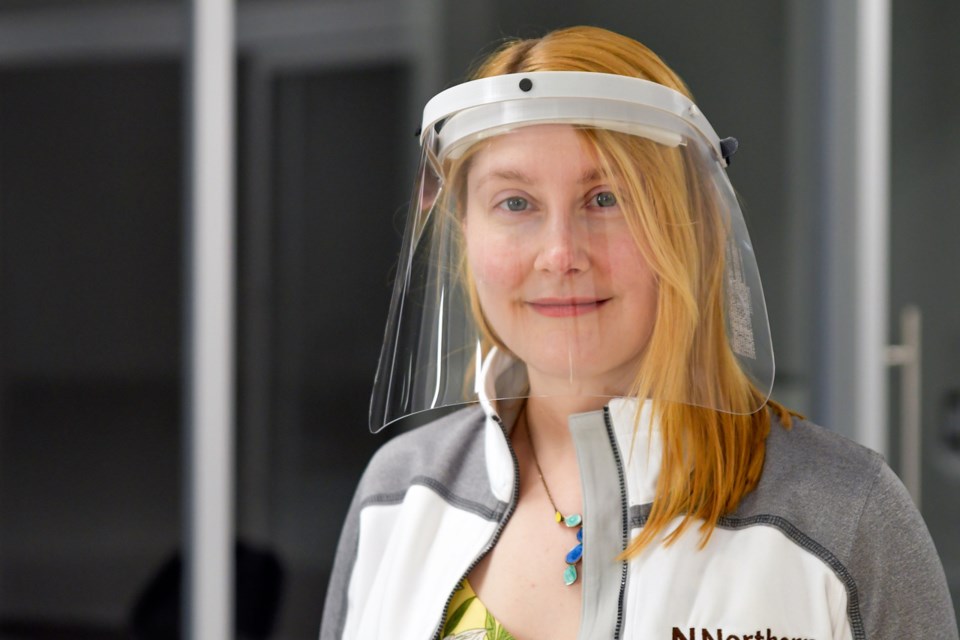 Northern College Manager of Applied Research, Entrepreneurship and Innovation Amy McKillip with one of the face shields being made for the local health sector. Supplied photo