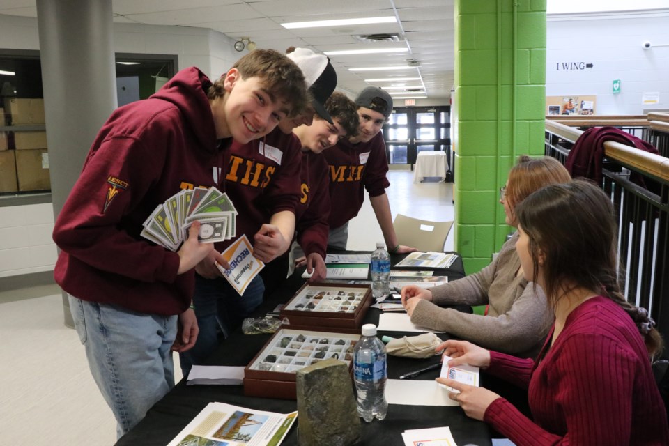 Caylen Breault, Benoit Porterm Riley Browne and Brendan McGaghran earned their pay at the Ministry of Mining booth at Northern College.