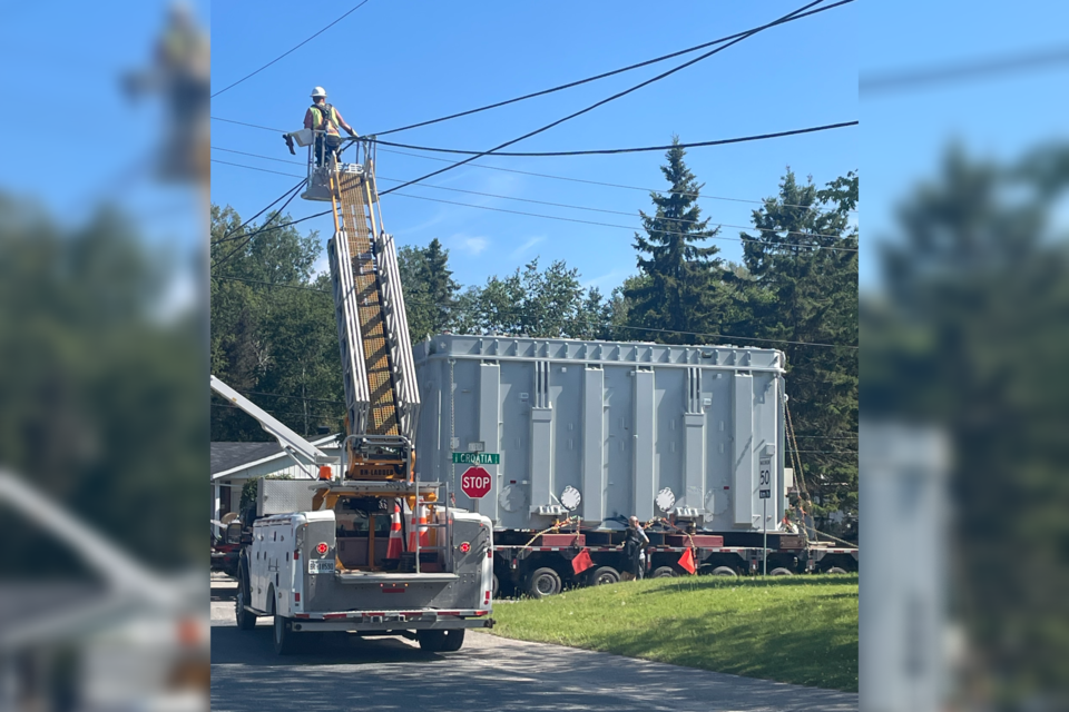 Hydro One moves a new high-voltage transformer to the Porcupine Transformer Station in Gold Centre.