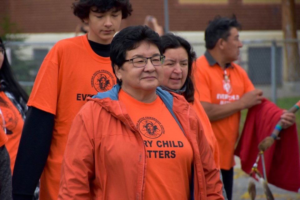 Wearing their orange shirts, people of all ages walked the streets of Timmins today to honour residential school survivors and their families, as well as those who didn’t make it home. Earlier this week, Orange Shirt Day was proclaimed for Sept. 30, with everyone being encouraged to wear something orange on Sunday. Maija Hoggett/TimminsToday