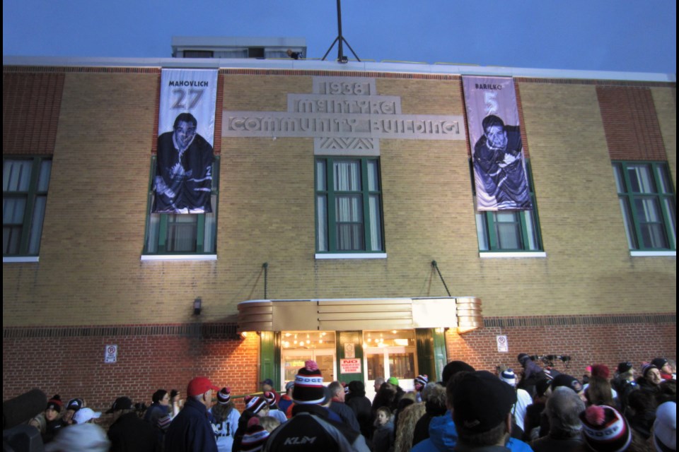 The banners of Frank Mahovlich and Bill Barilko were unfurled in front of the McIntyre Arena on Sunday evening. Andrew Autio for TimminsToday                                