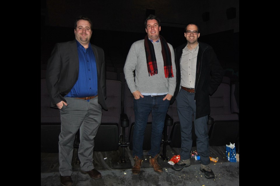 William Woods (centre), Producer of Mean Dreams, flanked by Jason Boisonneault (left) and John Belanger (right) of the Timmins Film Society after the screening of the movie and a Q&A session with Woods. Frank Giorno for TimminsToday.