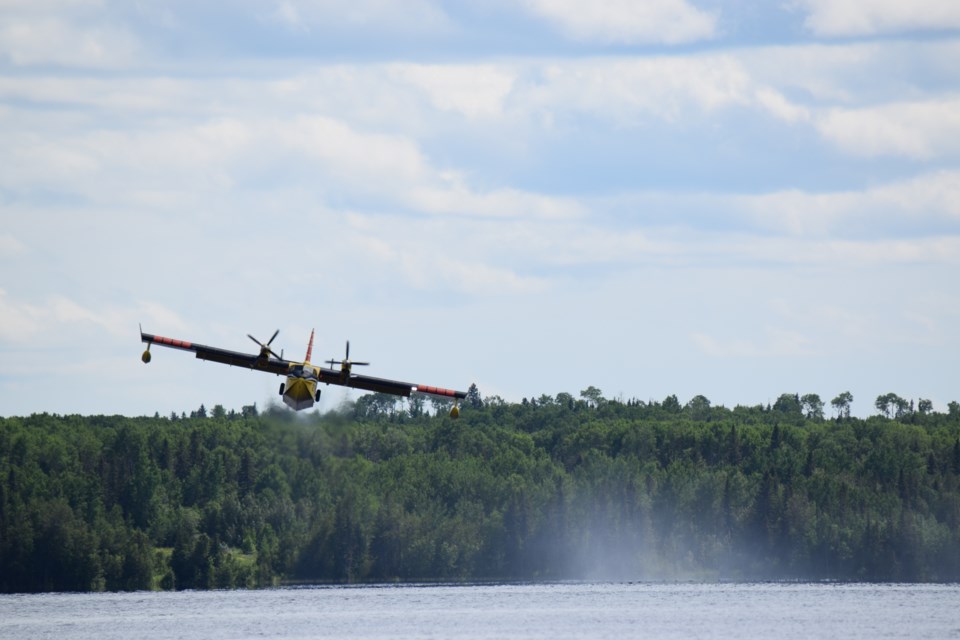 MNRF water bombers fill up at Kamiskotia Lake. Cameron Grant photo