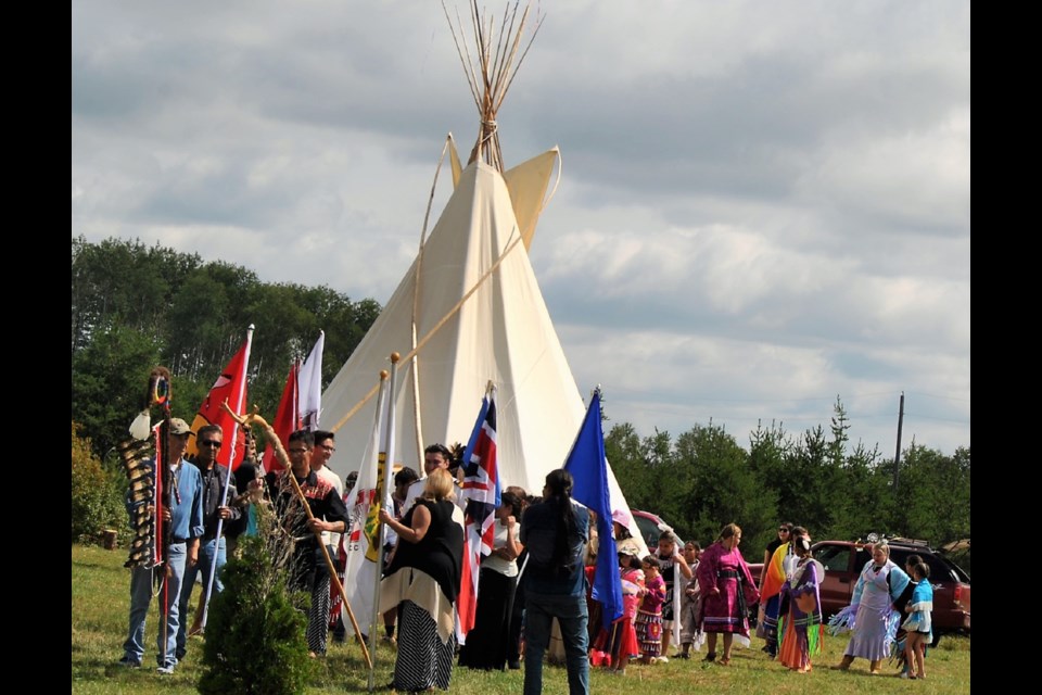 Elders and dancers get ready for the grand entry for the 2017 Mattagami First Nation Pow Wow. Once grand entry begins no photos or videos of the solemn procession are allowed.  From left to right: past Chief Walter Naveau, Leonard Naveau and newly elected Chief Chad Boissoneau, Frank Giorno for TimminsToday
