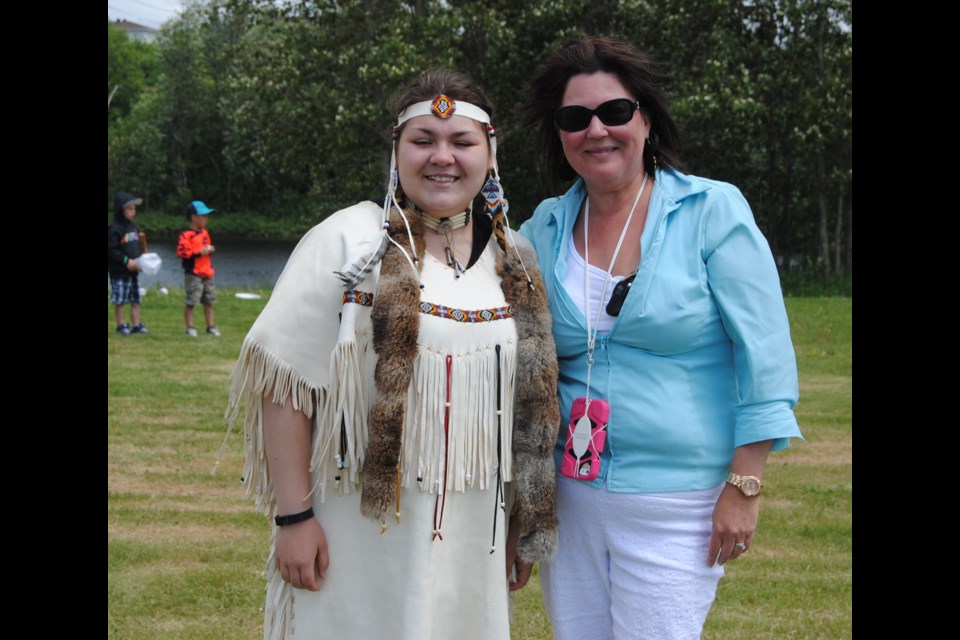 On National Aboriginal Day, June 21, First Nation, Inuit and Metis culture is celebrated across Canada. Pictured are Debbie Proulx-Buffalo (right) and her grand daughter who wears traditional Cree regalia (left). Photo by Frank Giorno TimminsToday.com staff