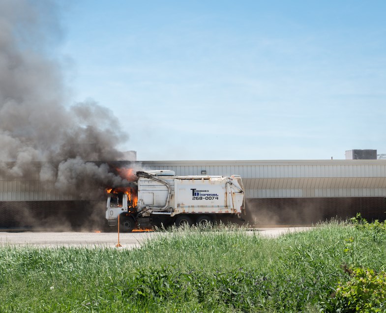 A garbage truck burns next to the Porcupine Mall. Witnesses say it later exploded. TimminsToday.com/Lisa Jamieson