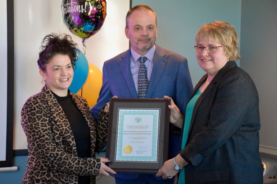 Timmins Academic Family Health Team lead physician Dr. Yves Raymond and executive director Jennifer McLeod with Sylvie Lamothe from Timmins MPP Gilles Bisson's office. Maija Hoggett/TimminsToday