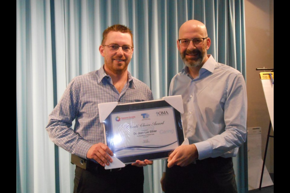 Provided photo shows Dr. Jean-Luc Ethier receiving his Patients' Choice award in 2017      
