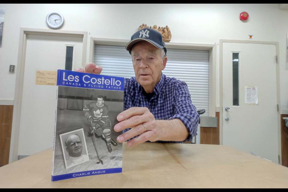 Timmins Food Bank president Rick Young showed a biography about Father Les Costello, the famous hockey player of The Flying Fathers Hockey Team.