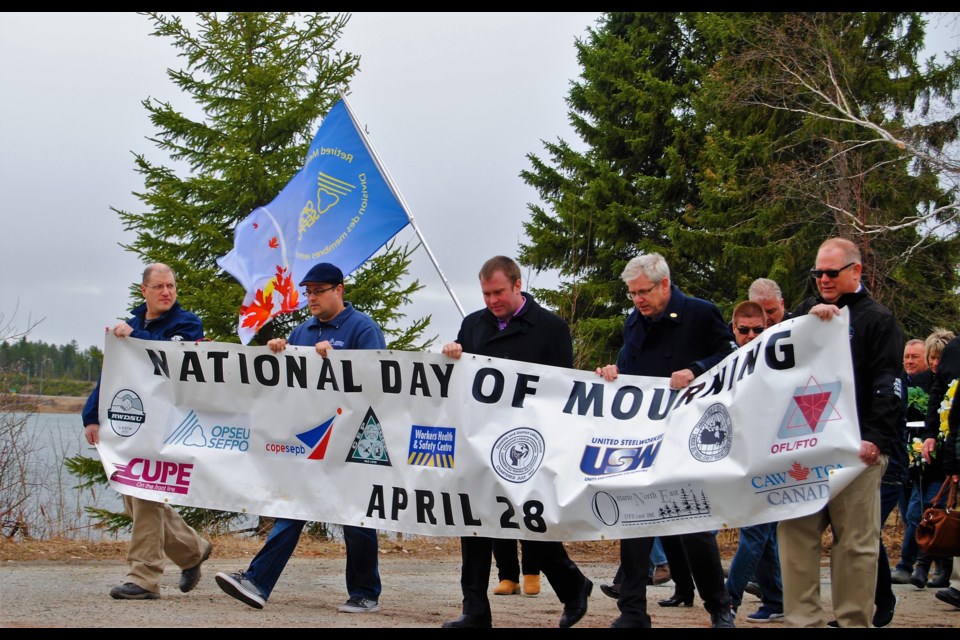 Members of Timmins and District Labour and their supporters including Timmins Mayor Steve Black and MP Charlie Angus arrive at the Porcupine Miners Memorial to observe National Day of Mourning 2017. Frank Giorno for TimminsToday.