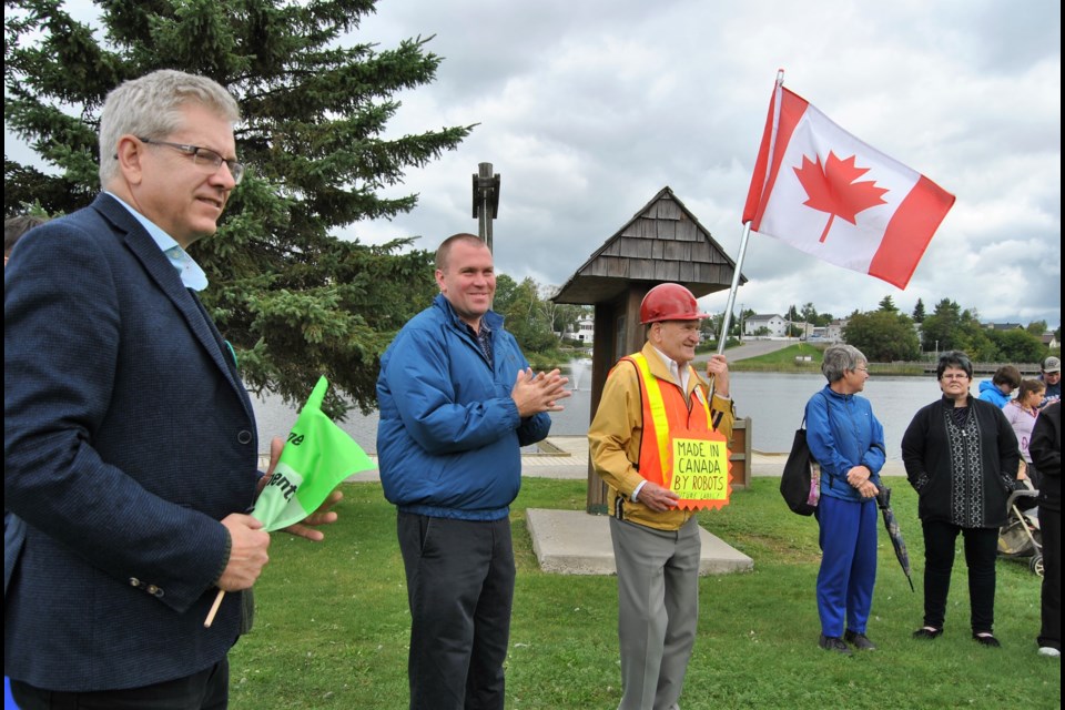 Timmins gathered at Gillies Lake for annual Labour Day walk. Charlie Angus (left), Mayor Steve Black, (2nd from left) and Karl Habla, (3rd from left) led the crowd of about 200 in a walk around Gillies Lake. Frank Giorno for TimminsToday.