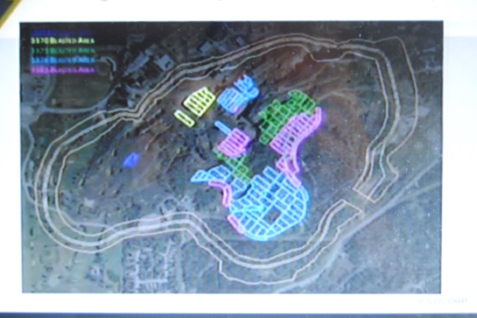 Diagram showing the three pits being created by Goldcorp to first extract gold at their Hollinger Project. The large blue zone is Site 92, the larges of the three work areas and closest to the residents of Fairway Village Trailer Park. Photo of Goldcorp slide taken by Frank Giorno, timminstoday.com staff