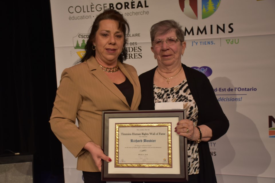 Richard Bouvier was inducted into the City of Timmins Human Rights Wall of Fame posthumously. The award was received at the Evening of Applause ceremony by his daughter Diane Hurtubise, left, and his wife Claudia. Maija Hoggett/TimminsToday