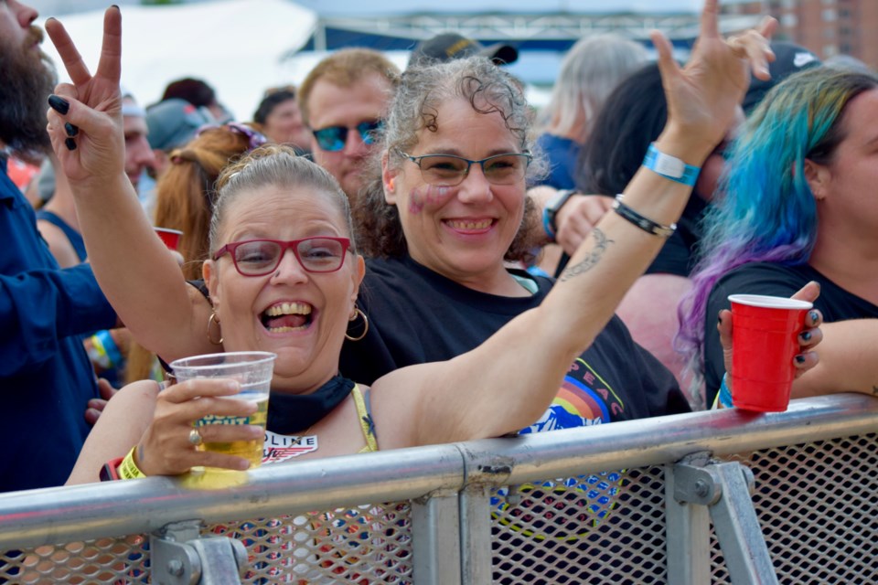 People enjoy the acts at Rock on the River in Timmins on July 22, 2022.