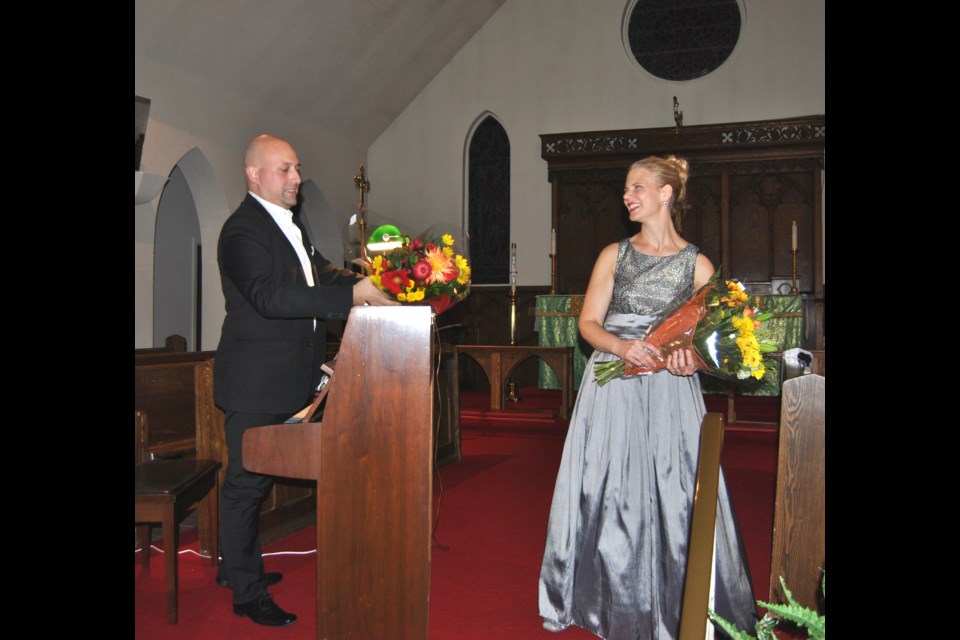 Soprano Maghan McPhee and pianist Carl Philipe Gionet with flowers presented after a superb performance at St. Matthew's Church in Timmins, on Wednesday October 5, 2016. Photo: Frank Giorno, Timminstoday.com