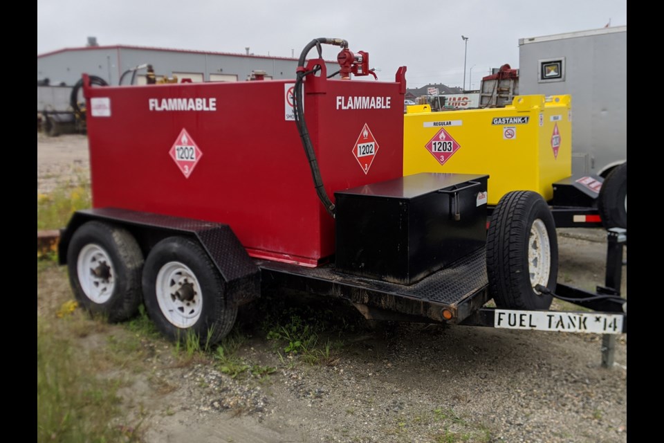Police are looking for who stole this black homemade 2009 flatbed trailer with a red 3,000 litre fuel tank attached from a Highway 11 construction site. Supplied photo