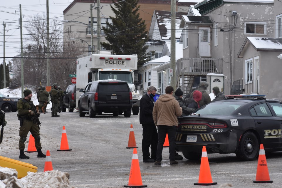 The first of two men taken from the Sixth Avenue containment in Timmins on Jan. 5.