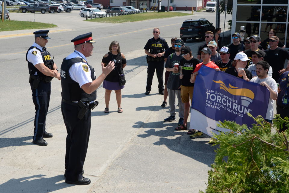 Timmins Police and South Porcupine OPP took part in the annual Law Enforcement Torch with about 40 local athletes.