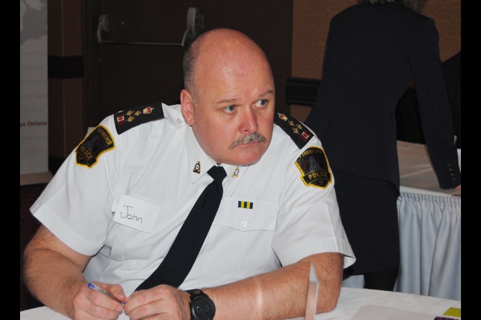Timmins Police Chief John Gauthier participating in table discussions on how to revise the Police Services Act. Photo by Frank Giorno