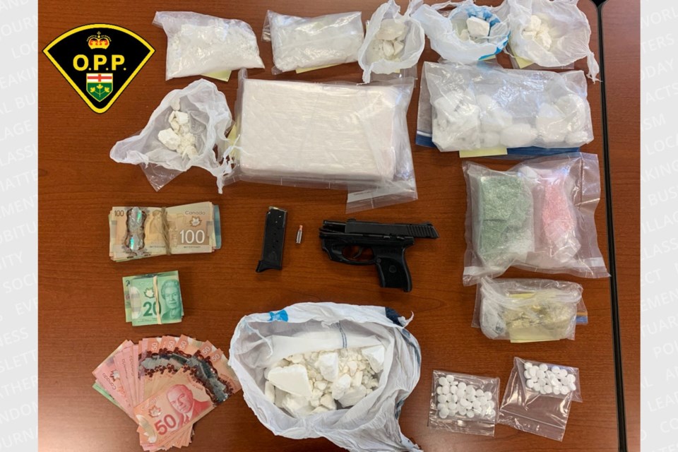 Suspected drugs with an estimated street value of $400,000 were seized during a traffic stop on Highway 11 in Cochrane.
